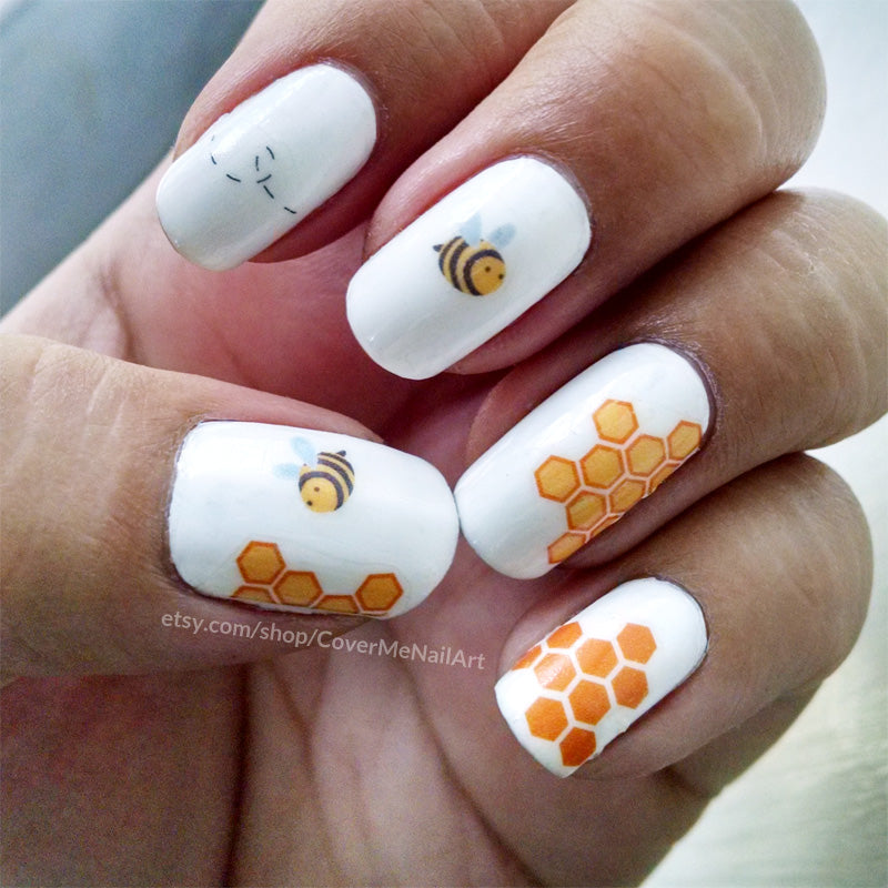 honey bee nail art with flying bee and honeycombs