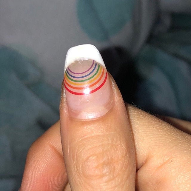 rainbow nail art decal on thumb