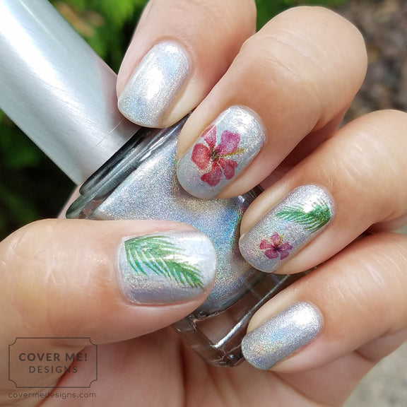 hibiscus flower and palm leaf nail art decals on holographic nail polish